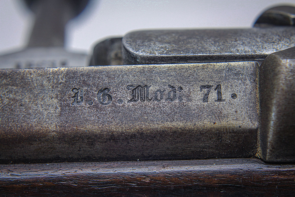 Fraktur – old German script – adorns the 19th Century Model 1871s.